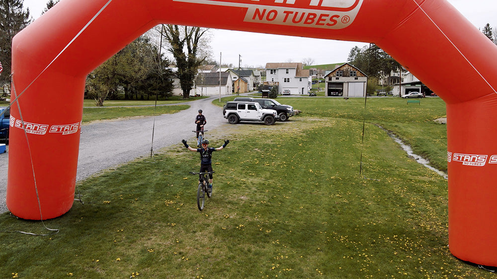 Will crossing under the Stan's arch to meet his family and friends to celebrate the completion of his monster ride.